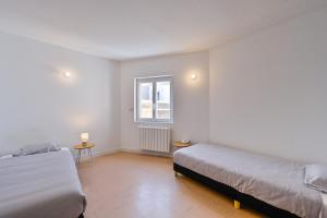 Postel nebo postele na pokoji v ubytování L'Escale Brièronne - Confortable au cœur de la Brière