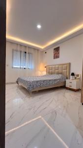 Postel nebo postele na pokoji v ubytování Italian design et Vue panoramique