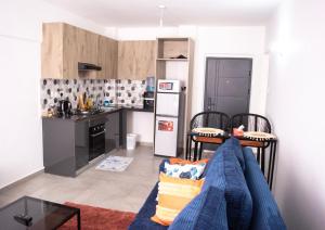 Kuchyň nebo kuchyňský kout v ubytování KerryHomes-1bdr Syokimau + 5 fotografií