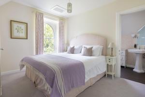 Giường trong phòng chung tại Monteviot Stables West +26 ảnh