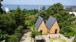 an overhead view of a house with a solar roof at SEA Side-მზის მხარე- N 1 in Makhinjauri