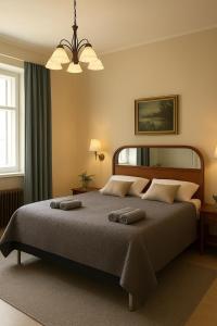 Postel nebo postele na pokoji v ubytování Senate Hotel