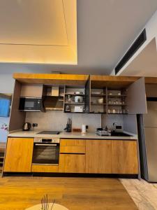 Kuchyň nebo kuchyňský kout v ubytování Elite Luxury Suites at Diamond in City + 46 fotografií