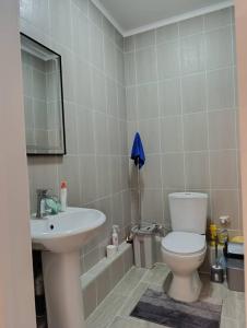 Koupelna v ubytování Bright harbor + 4 fotografie