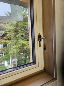 a close up of a door with a window at Bartles Hus in Mellau