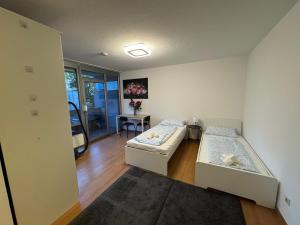 Postel nebo postele na pokoji v ubytování Mini Apartment Saarlouis