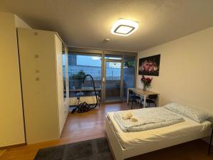 Postel nebo postele na pokoji v ubytování Mini Apartment Saarlouis