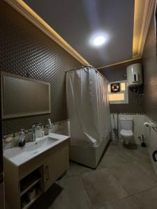 Ένα μπάνιο στο Garden View apartment +6 φωτογραφίες