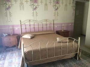A bed or beds in a room at Hotel Sant'Anna