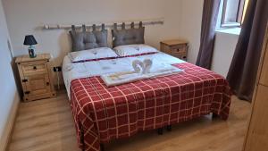 Postel nebo postele na pokoji v ubytování Appartamento Stella