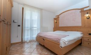 Katil atau katil-katil dalam bilik di Centro Appartamenti Vacanze +10 gambar