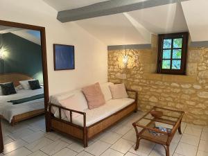 Postel nebo postele na pokoji v ubytování La Closerie de Baneuil + 105 fotografií