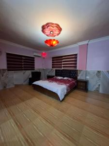 Postel nebo postele na pokoji v ubytování مزرعة اللؤلؤة الريفية