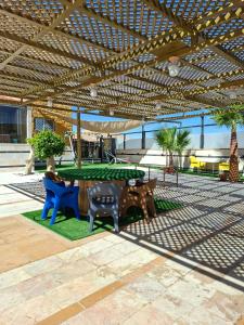 Restaurace v ubytování مزرعة اللؤلؤة الريفية + 32 fotografií