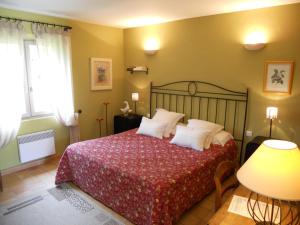 Postel nebo postele na pokoji v ubytování B&B La Badelle