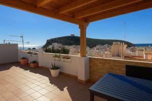 a balcony with a view of a city at Palma79-Kira in Águilas
