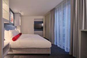 Krevet ili kreveti u jedinici u okviru objekta Essential by Dorint Düsseldorf Deiker Höfe