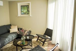 Posezení v ubytování Natuur Villa met Hottub & Sauna | 2 personen - Resort Valley + 21 fotografií