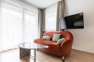 Μια τηλεόραση ή/και κέντρο ψυχαγωγίας στο Chasa Vaidum by MEIN SAMNAUN - MOUNTAIN HOMES
