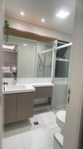 Ένα μπάνιο στο Comfort Jardins - Apartamento completo em frente ao Shopping Jardins