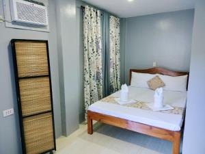 Postel nebo postele na pokoji v ubytování Bunakidz Lodging House