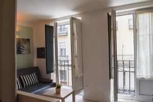 Μια τηλεόραση ή/και κέντρο ψυχαγωγίας στο Apartamentos Marqués de Abastos