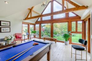 a large living room with a pool table at 2 Bed in Upper Quinton oc-p33608 in Mickleton