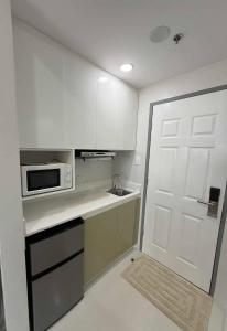 Kuchyň nebo kuchyňský kout v ubytování Studio Condo Unit- Bayani Hall Dagupan