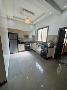 Kuchyň nebo kuchyňský kout v ubytování dar houdou