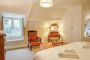 Voodi või voodid majutusasutuse 3 Bed in Calbourne oc-g33538 toas