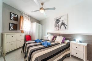 Ένα ή περισσότερα κρεβάτια σε δωμάτιο στο Casita Azul