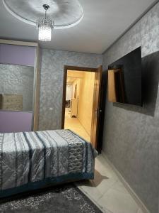 Postel nebo postele na pokoji v ubytování Appartement Centre-Ville kenitra