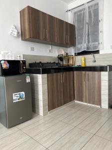 Kuchyň nebo kuchyňský kout v ubytování Comfy Inky Stays