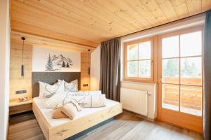 Postel nebo postele na pokoji v ubytování Ferienhaus Morx Puite