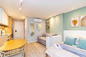 Ένα ή περισσότερα κρεβάτια σε δωμάτιο στο Studio Premium p/ 4 pessoas no All Batel - BAT1316