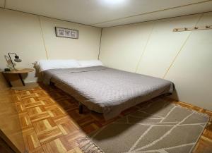 Postel nebo postele na pokoji v ubytování Càmping Kanguro