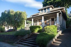 a small house with stairs in front of it at Cascade Chic 30 day minimum in Hood River