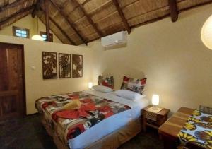 Tempat tidur dalam kamar di DEVOCEAN Lodge