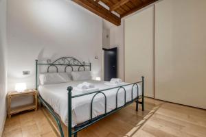 Postel nebo postele na pokoji v ubytování BluesHouse San Felice