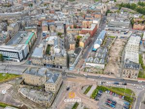 an aerial view of a city with buildings at Trades Lane by CENTRAL SERVICED APARTMENTS - Cosy 1 Bedroom - Walk Away From City Quay V&A - Walk to Bus and Train Station - Easy Access to City Centre - Fast Wi-Fi - Fully Equipped - Weekly & Monthly Stay Offers in Dundee
