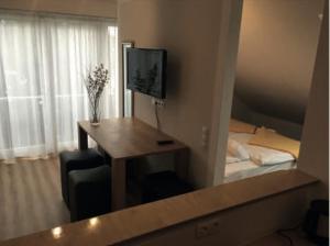 Postel nebo postele na pokoji v ubytování Hotel Kurpfalz + 1 fotografie