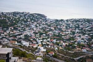 an aerial view of a city with houses at Viva B&B in Anavyssos