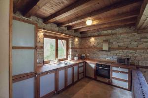 A kitchen or kitchenette at Leshten Guest Homes
