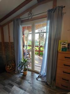 Afbeelding uit fotogalerij van Domek nad stawem in Nowy Wiec