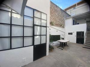 Balkón nebo terasa v ubytování ''Maison Gaïa'' Terrasse, wifi et garage