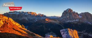 a view of a mountain range with the words wolf canyon at Dumbria Dolomites in Selva di Val Gardena