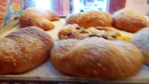 a bunch of donuts sitting on top of a table at B&B Mauro in Gioia Sannitica