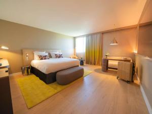 Voodi või voodid majutusasutuse Pullman Toulouse toas +140 fotot