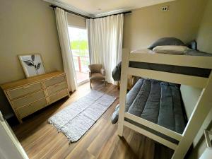 Ένα ή περισσότερα κρεβάτια σε δωμάτιο στο Kanoo Lodge