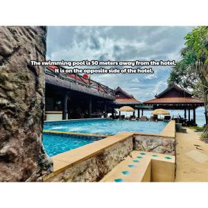 a quote about a resort with a swimming pool at Lanta Nature House in Ko Lanta